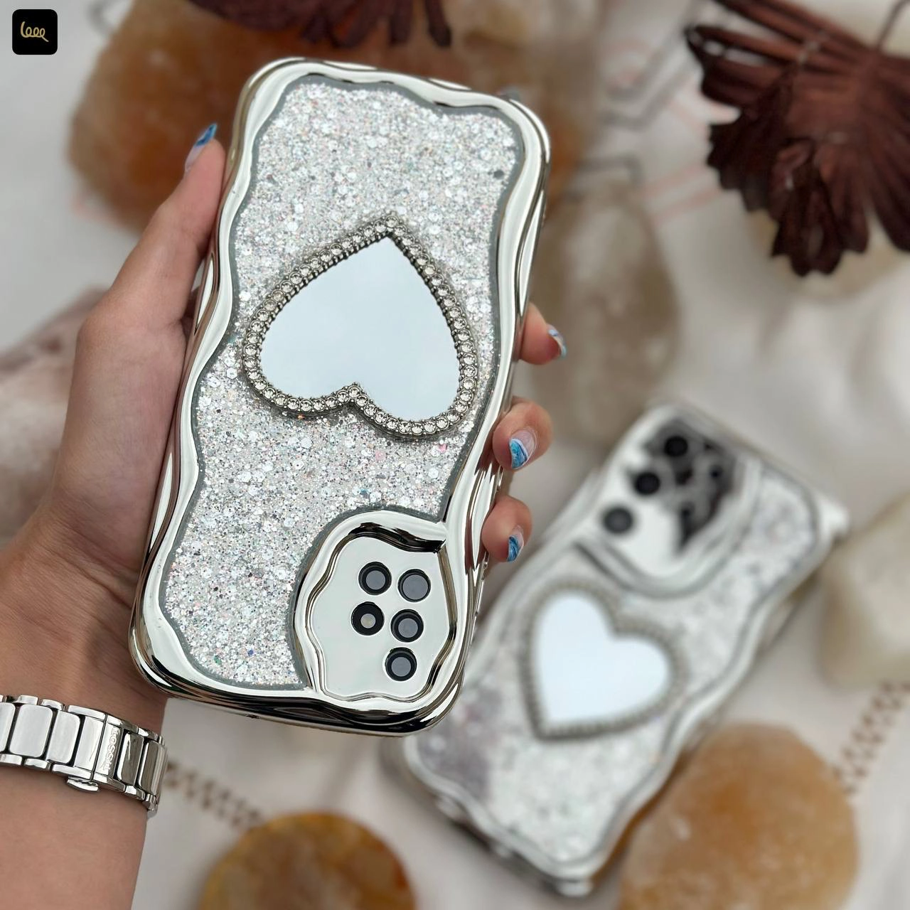 قاب گوشی سامسونگ قلبی گلیتری آینهای با فریم کروم موجدار روی گوشی قاب گوشی سامسونگ قلبی گلیتری آینهای با فریم کروم موجدار روی گوشی